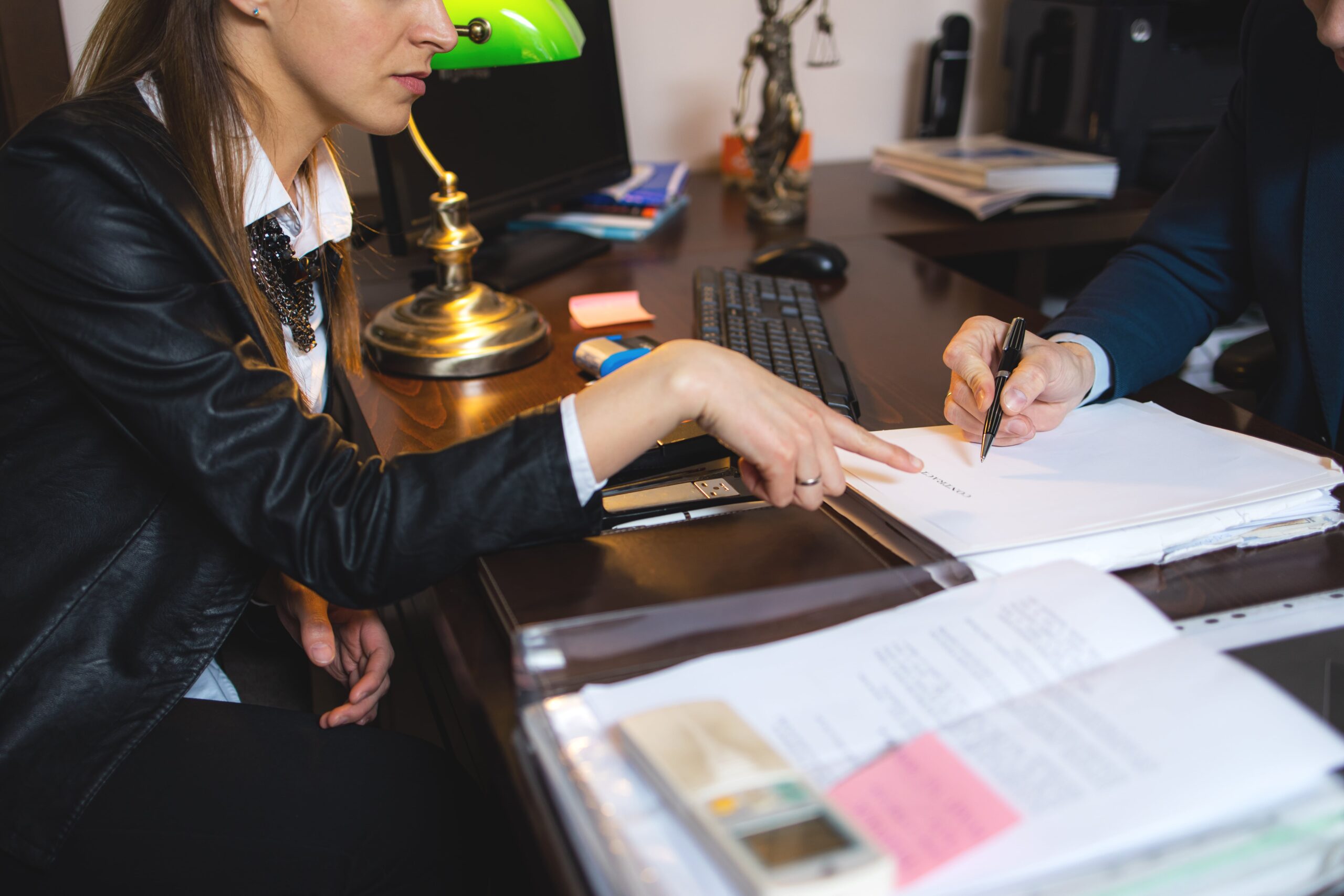 female client working with attorney